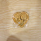 Packaged heart-shaped kumkum holder for gifting