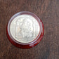 Decorative Ganesh Coin placed on a traditional pooja thali, symbolizing prosperity.