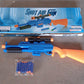 Angled view of the large plastic toy gun, ready for imaginative battle play.