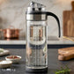 Glass oil dispenser bottle with handle and flip lid for kitchen