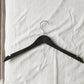 Hanger in use for wardrobe organization and clothes hanging