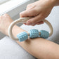Use of muscle roller massager on arms and legs