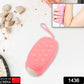 Close-up of the dual-sided body scrubber highlighting its soft silicone texture.