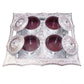Traditional mukhvas dani with secure airtight lids on a dark background.