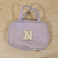 Detailed view of multi-pocket toiletry pouch with compartments