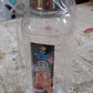 Upright transparent kitchen storage bottle with its steel cap