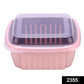 Collapsible strainer and food washing basket in a modern kitchen.