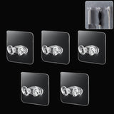 Set of five durable adhesive plastic wall hooks for home organization