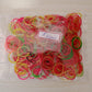 Close-up of versatile multicolor rubber bands for everyday household tasks.