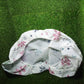 Patterned AC dust cover enhancing the aesthetics of an indoor space.