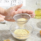 Tea strainer in use for kitchen straining