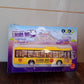 Rear view of the yellow mini bus toy showing detailed craftsmanship