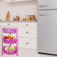 Organivo 3-tier plastic storage rack in a kitchen setting, holding fruits and vegetables.