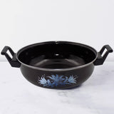 14 inch cast iron kadai showing rustic texture and wide base for Indian cooking