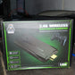 Complete package of the Spark Tots Wireless Gaming Console with controllers and accessories.