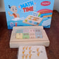 Packaging for the Aditi Wooden Math Game, an educational toy for young learners.