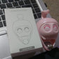 Easy-to-install no-drill wall hook with a cute cat design on a smooth surface.