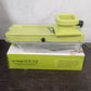 Kitchen scene featuring the efficient Quickslice vegetable and fruit cutter.