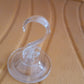 Close-up clear suction cup hook showing strong adhesion mechanism
