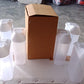 Arrangement of Organivo easy flow plastic storage containers in a kitchen setting.