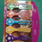 Back view of the vibrant 5-piece cheese knife set packaging.
