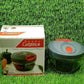 Lifestyle shot of the manual food chopper being used to prepare ingredients for a meal.