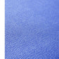 Eco-friendly Yoga Mat unrolled on a wooden floor.