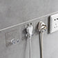Set of transparent wall storage hooks arranged in a kitchen for efficient organization.