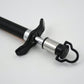 Close-up of the stainless steel gas lighter producing a reliable spark for ignition.