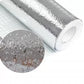 Aluminium kitchen foil applied to a kitchen drawer for protection.
