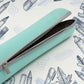 The versatile Multipurpose Zip Pouch laid flat, ready to organize school supplies.