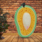 A single Mango Dish Sponge displayed, highlighting its unique fruit shape.