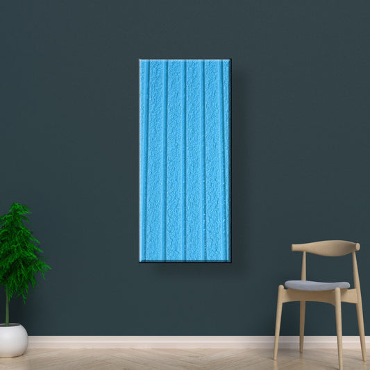 Self-adhesive 3D foam wallpaper being applied to a living room wall.