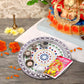 Close-up view of decorative items within the Arrive Kit business startup collection.