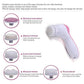 The pink 5-in-1 facial massager ready for use, highlighting its sleek design.