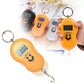 Side view of the handy digital scale, highlighting its ergonomic shape.