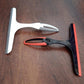 Versatile plastic kitchen wiper, perfect for achieving streak-free glass and kitchen surfaces.