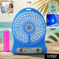 Mini table fan showing detachable rechargeable battery for portability