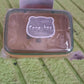 Portable soap holder, perfect for travel and camping, keeping soap dry.