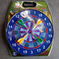 Packaging of magnetic dartboard game set with darts inside