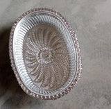 Multipurpose royal design oval silver gift tray for dry fruits.