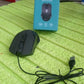 Compact wired optical mouse, ideal for travel and small workspaces.