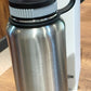 Portable stainless steel vacuum insulated water bottle for travel and gym use