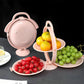 Serving stand showing tier separation for snacks and desserts