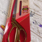 Durable stainless steel scissors, ideal for professional tailoring.
