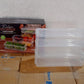 Efficient fridge organization using multiple clear plastic food storage containers.