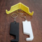 Multiple multicolor plastic keychain phone holders arranged together.