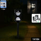 Outdoor solar powered LED lamp illuminating garden pathway at night