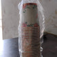 Variety of disposable paper cups suitable for tea, coffee, and water.