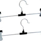 Organized wardrobe section showcasing clothes neatly hung on stainless steel hangers.